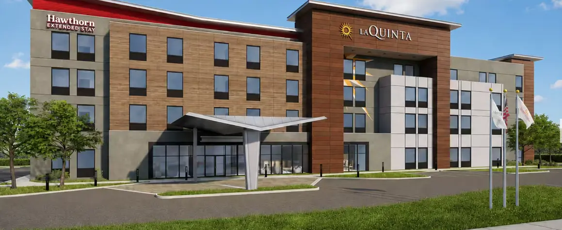 Hotel rendering with a gray and red building