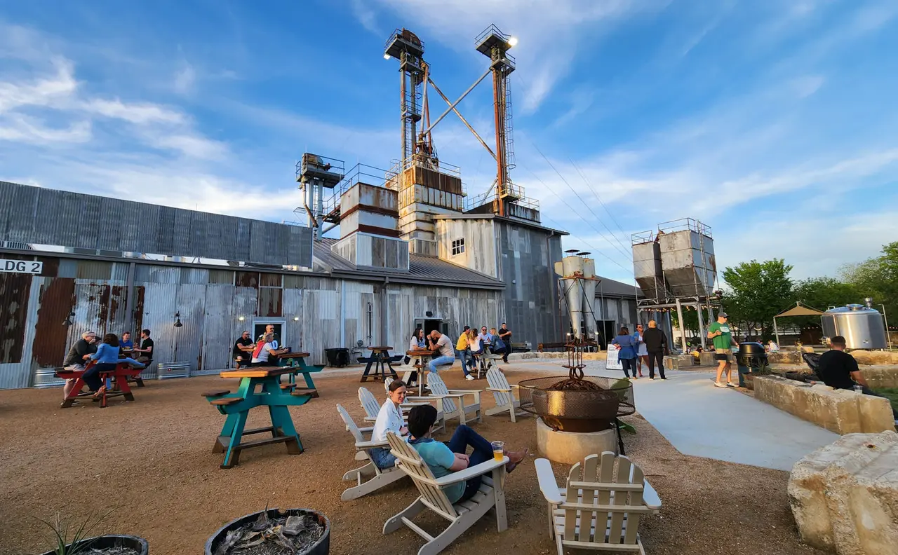 Outdoor seating in adirondack chairs and picnic tables at TUPPS