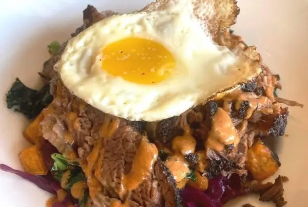 Breakfast hash with fried egg on top