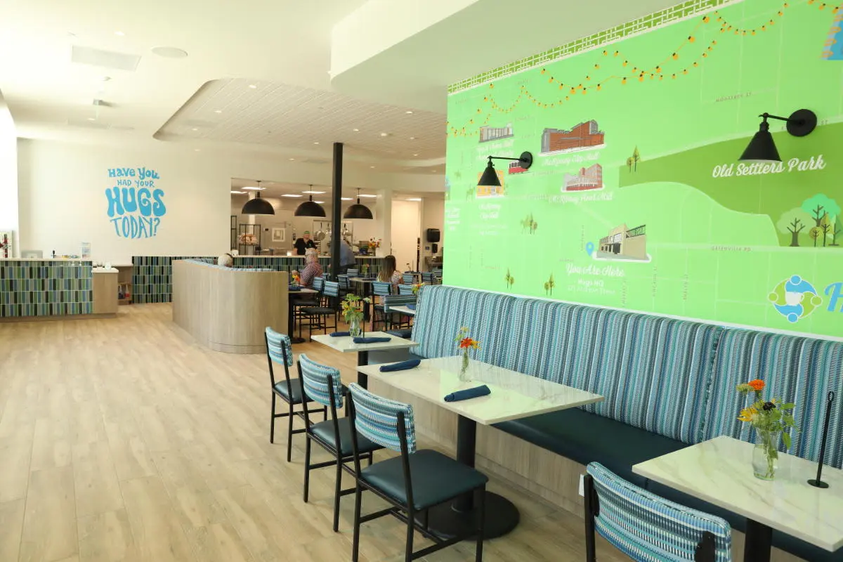 Interior shot of a cafe in Downtown McKinney with brightly colored furniture