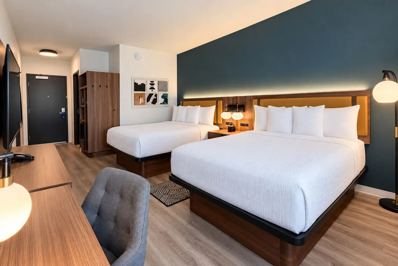 Hotel room with double queen beds