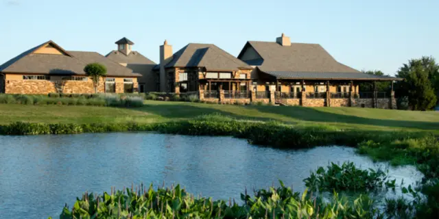 Golf course overlooking a pond