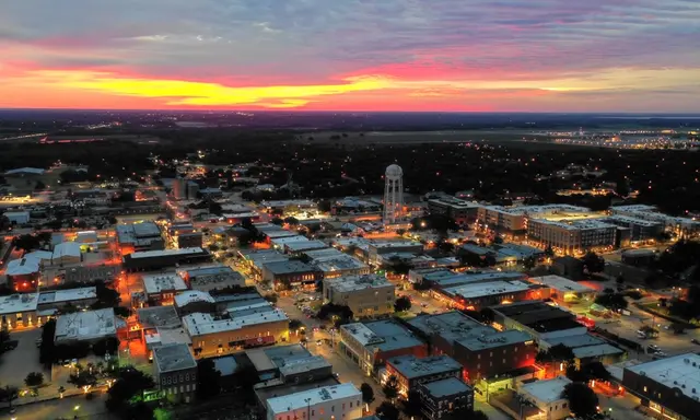 Drone image of Downtown McKinney at sunset