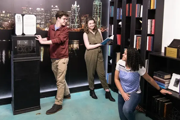 People trying to get out of an escape room