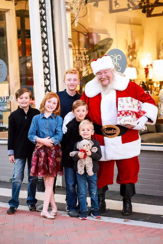 Group of children posing with Santa
