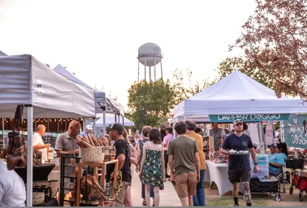 People shopping at a market in McKinney