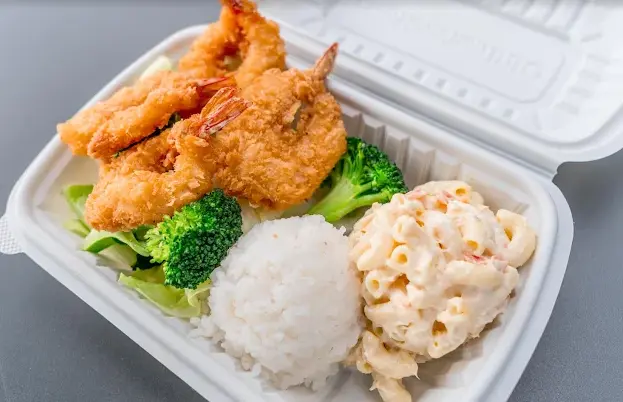 Platter of chicken, rice, and broccoli in a white to go box