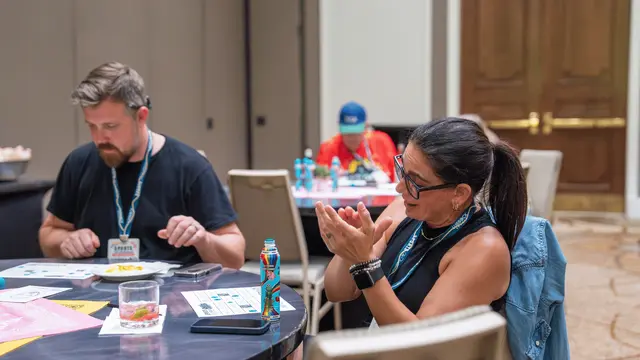 Woman clapping her hands together playing a game