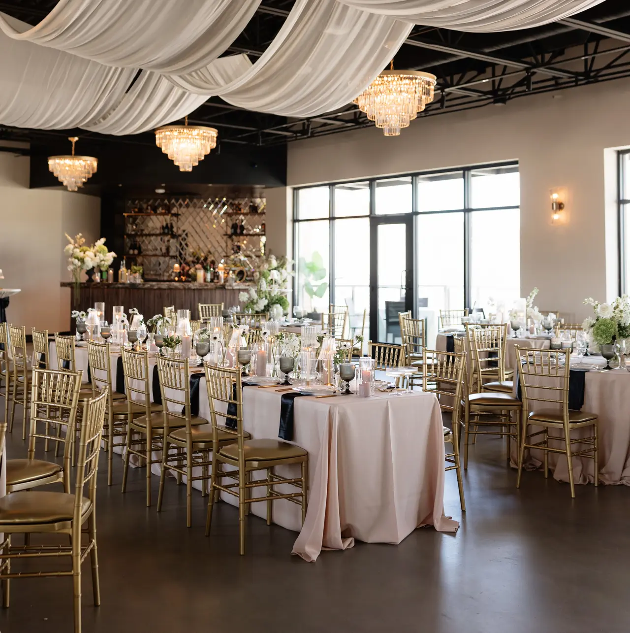Decorated event space in downtown McKinney with table dressed