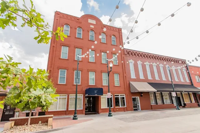 Hotel with red brick and string lights in Downtown McKinney
