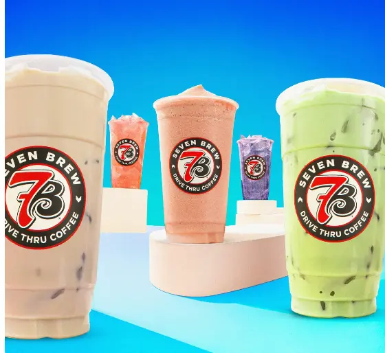 Five bubble tea and coffee drinks in branded cups arranged on white platforms against a blue gradient background