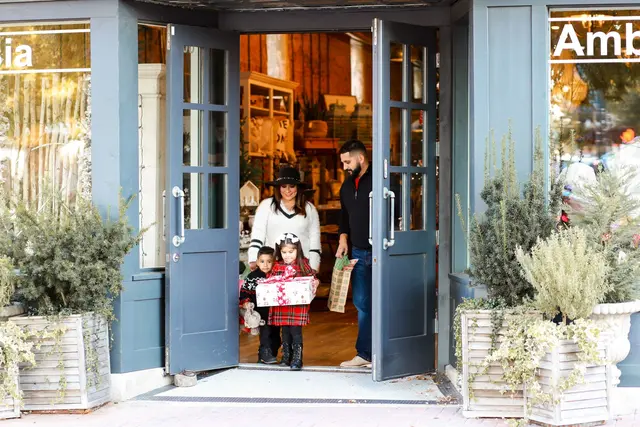 Family leaving a boutique in Downtown McKinney