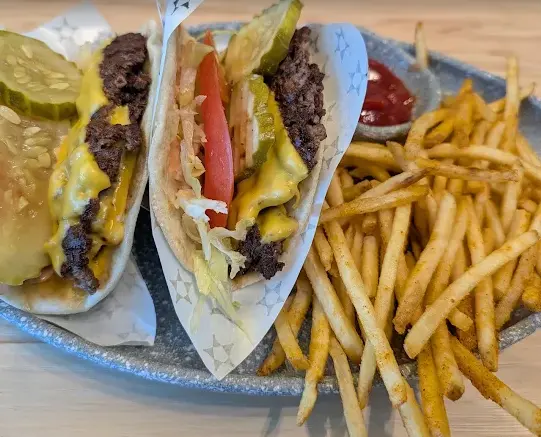 Tacos on a platter filled with different toppings