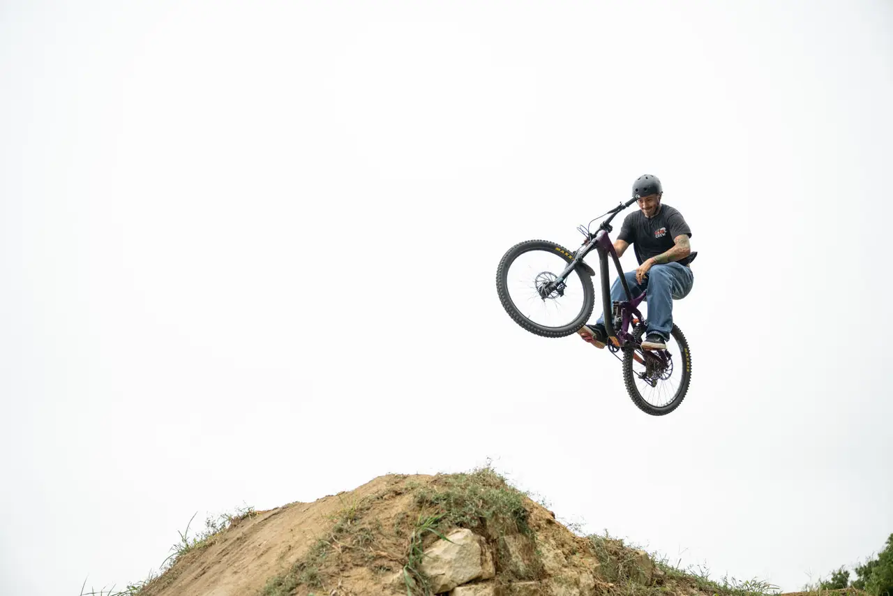 Young man mountain biking at Erwin Park in McKinney.