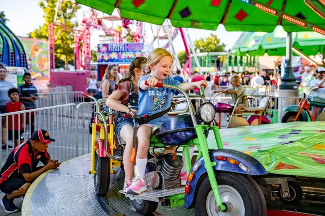 Kids on an amusement ride