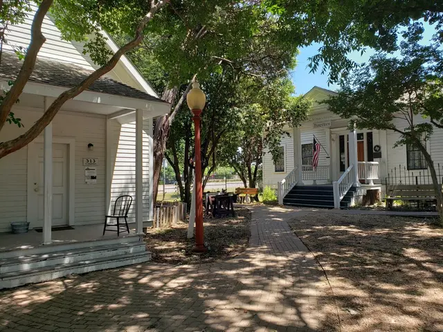 The one-room schoolhouse and Faires House at Chestnut Square