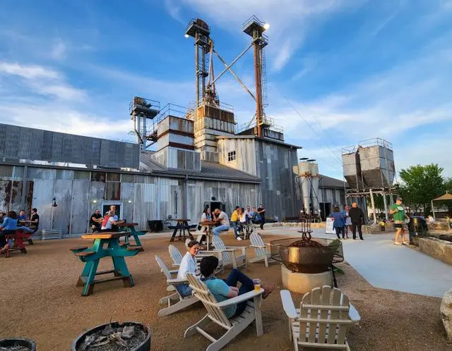 Adirondack chairs and picnic tables outside TUPPS Brewery